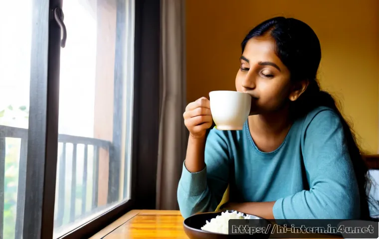 위장 장애 완화 방법 - Photorealistic Indian woman in modest casual clothing sitting comfortably at a clean kitchen table, ...
